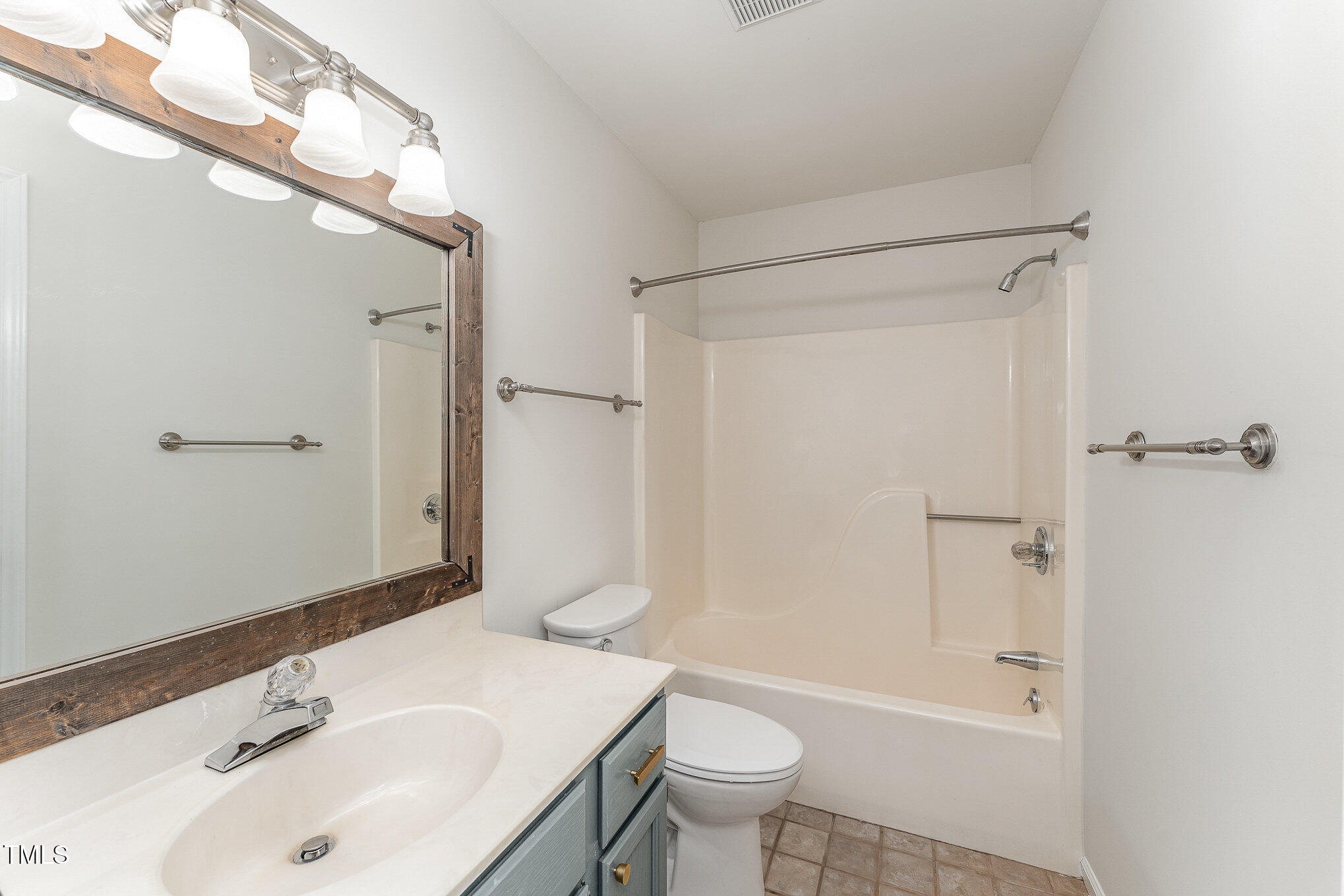 25 Sandstone Ridge Drive Durham, NC 27713 - Photo 15 of 33 a bathroom with a sink toilet and shower