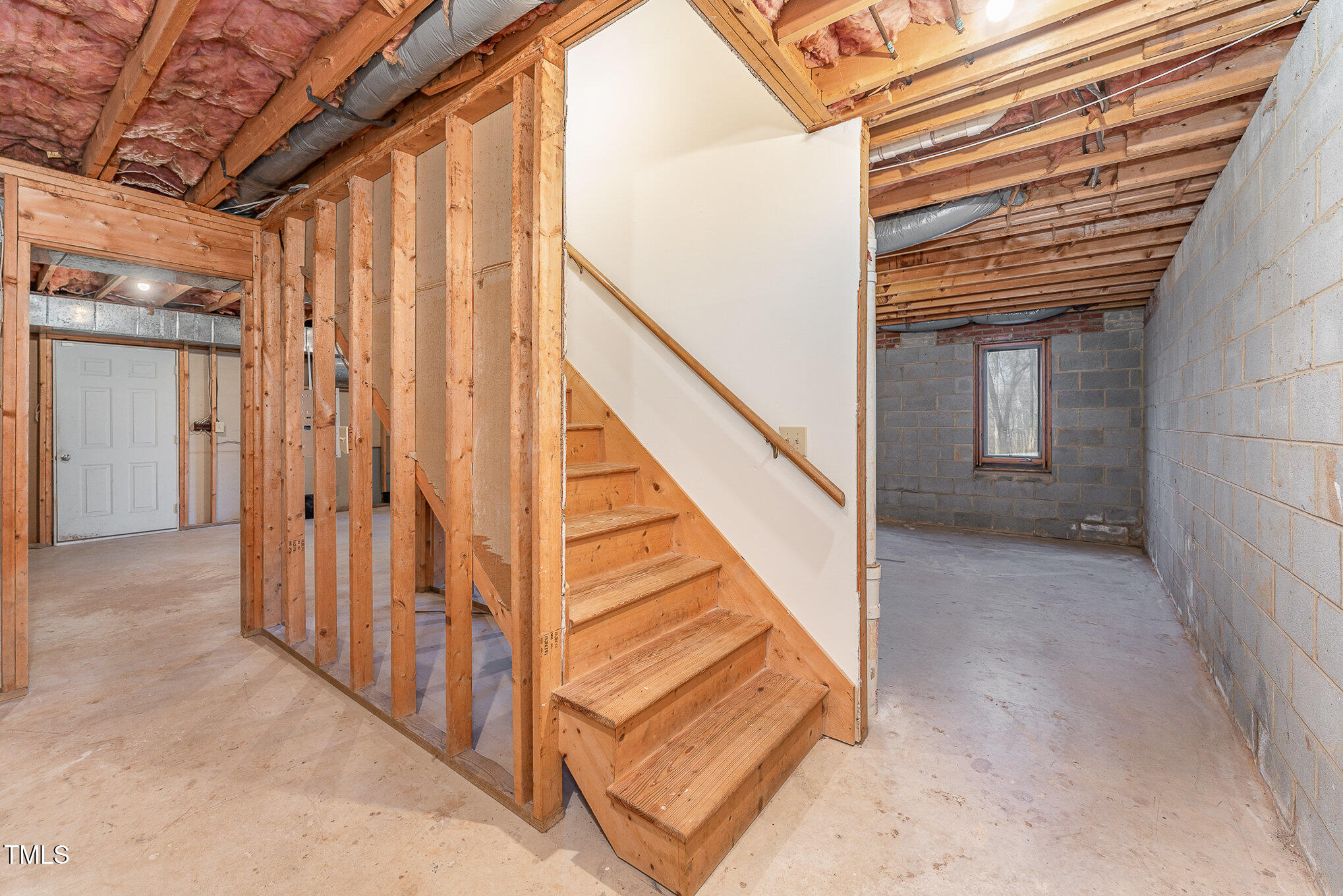 25 Sandstone Ridge Drive Durham, NC 27713 - Photo 19 of 33 a view of a hallway with wooden floor and staircase