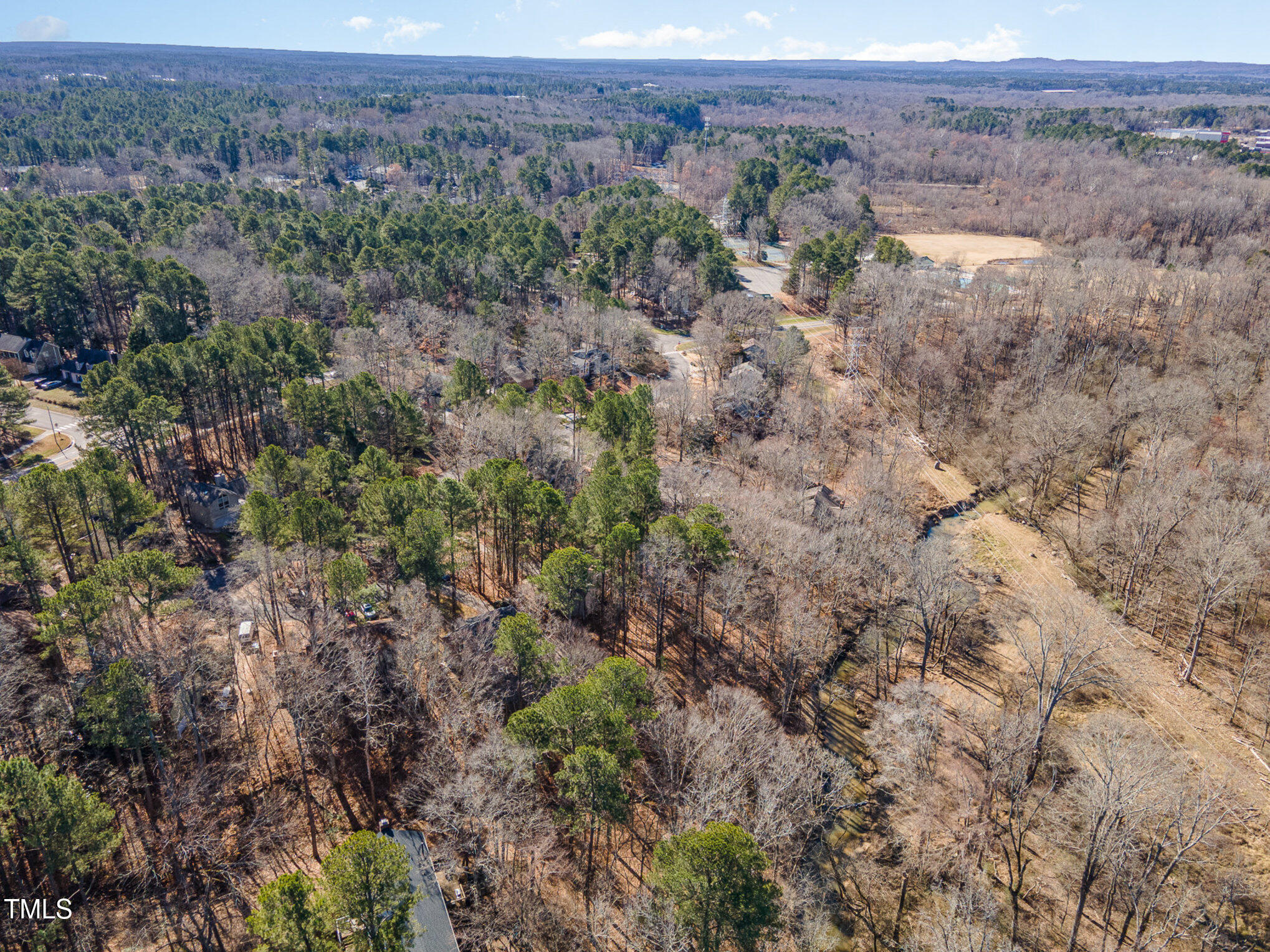 25 Sandstone Ridge Drive Durham, NC 27713 - Photo 29 of 33 an aerial view of mountain with trees around