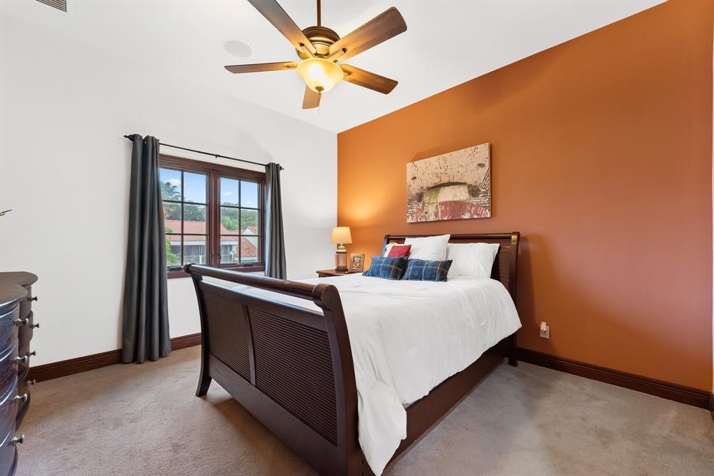 11621 Southwest 1st Street Plantation, FL 33325 - Photo 29 of 47 a bed sitting in a bedroom next to a window