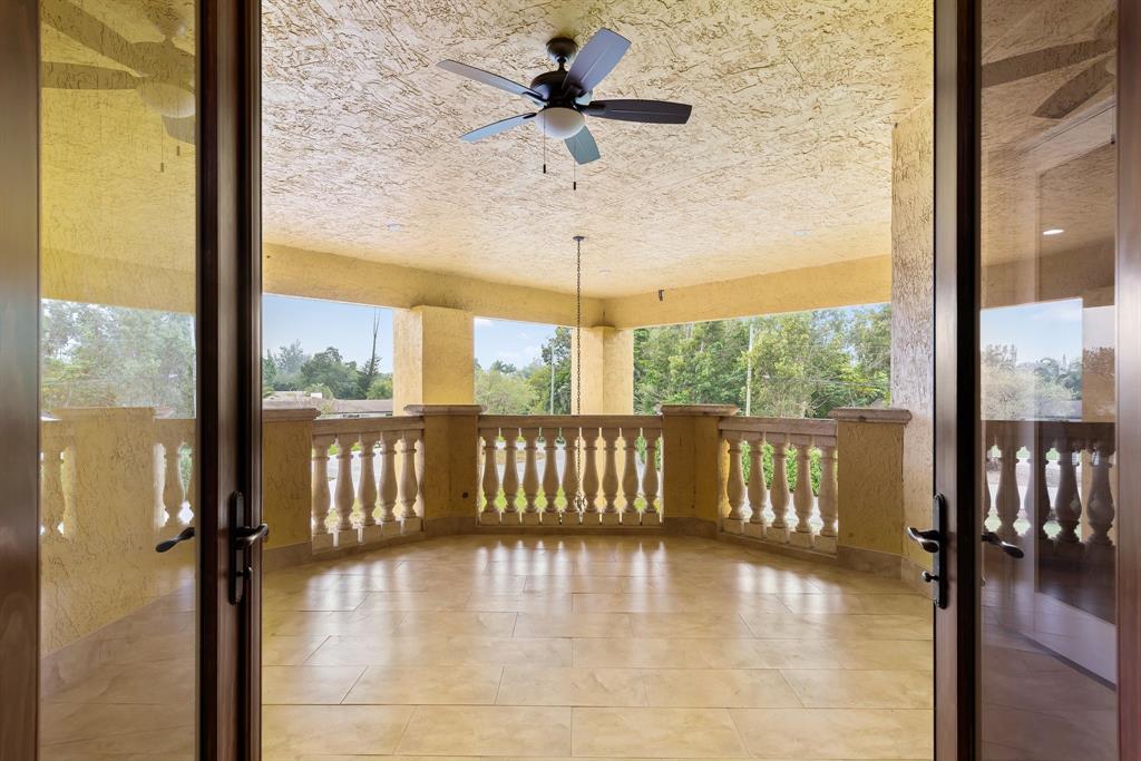 11621 Southwest 1st Street Plantation, FL 33325 - Photo 30 of 47 a view of a balcony with a potted plant