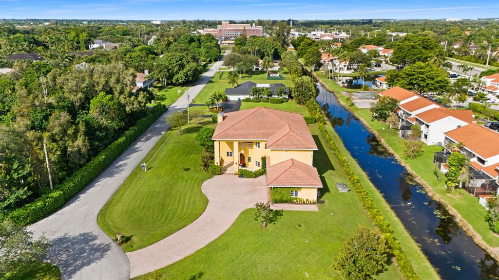 11621 Southwest 1st Street Plantation, FL 33325 - Photo 42 of 47 an aerial view of residential houses with outdoor space and swimming pool