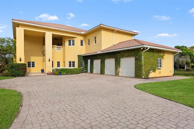 $1,695,000 | 11621 Southwest 1st Street, Plantation, FL 33325