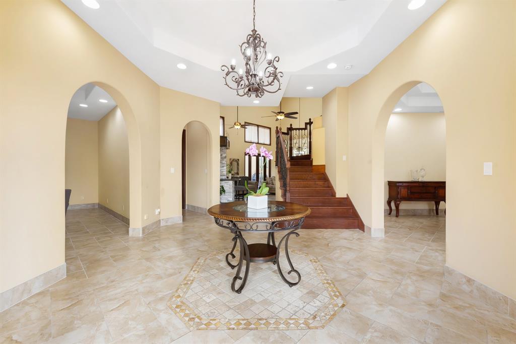 11621 Southwest 1st Street Plantation, FL 33325 - Photo 5 of 47 a view of a room with furniture and a chandelier