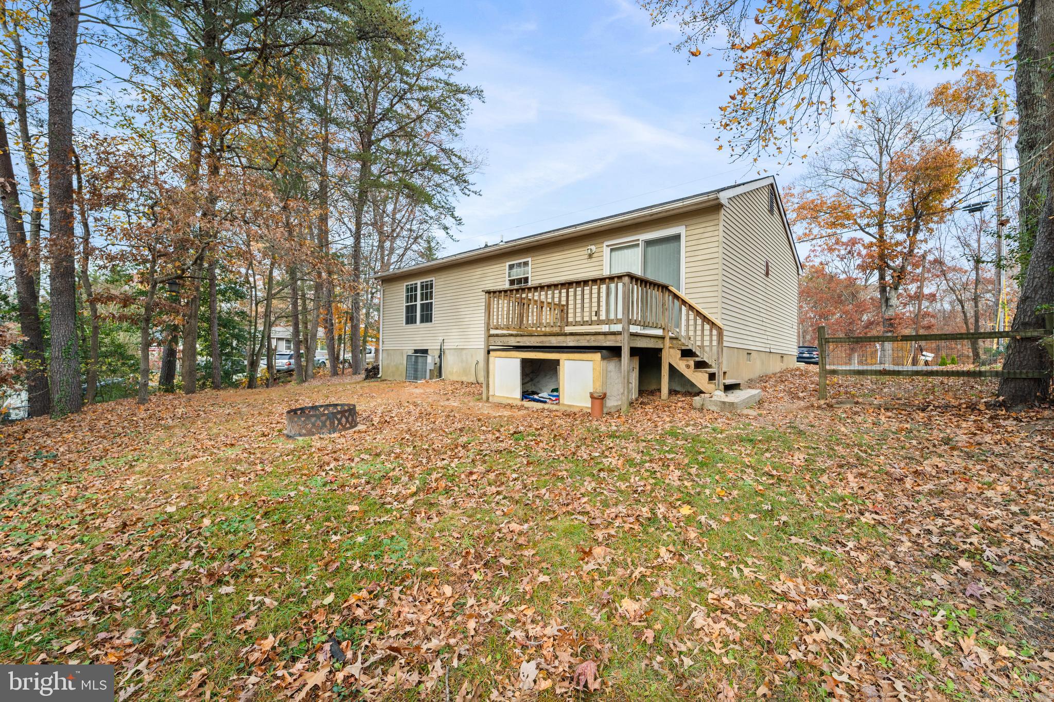 659 San Gabriel Road Lusby, MD 20657 - Photo 19 of 20 a front view of a house with a yard