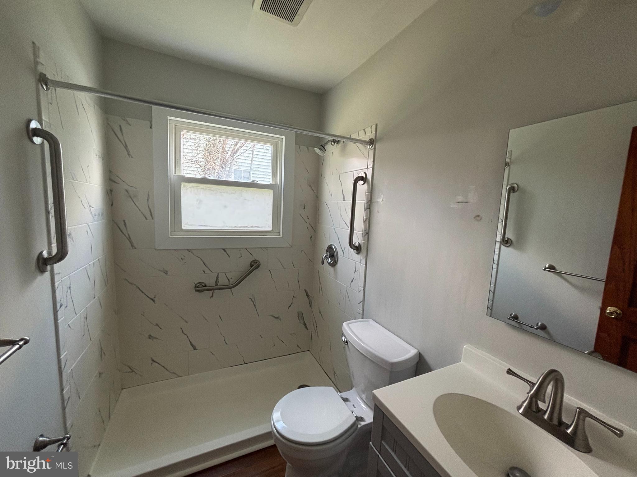 47 Walnut Street Ambler, PA 19002 - Photo 3 of 9 a bathroom with a sink toilet and shower