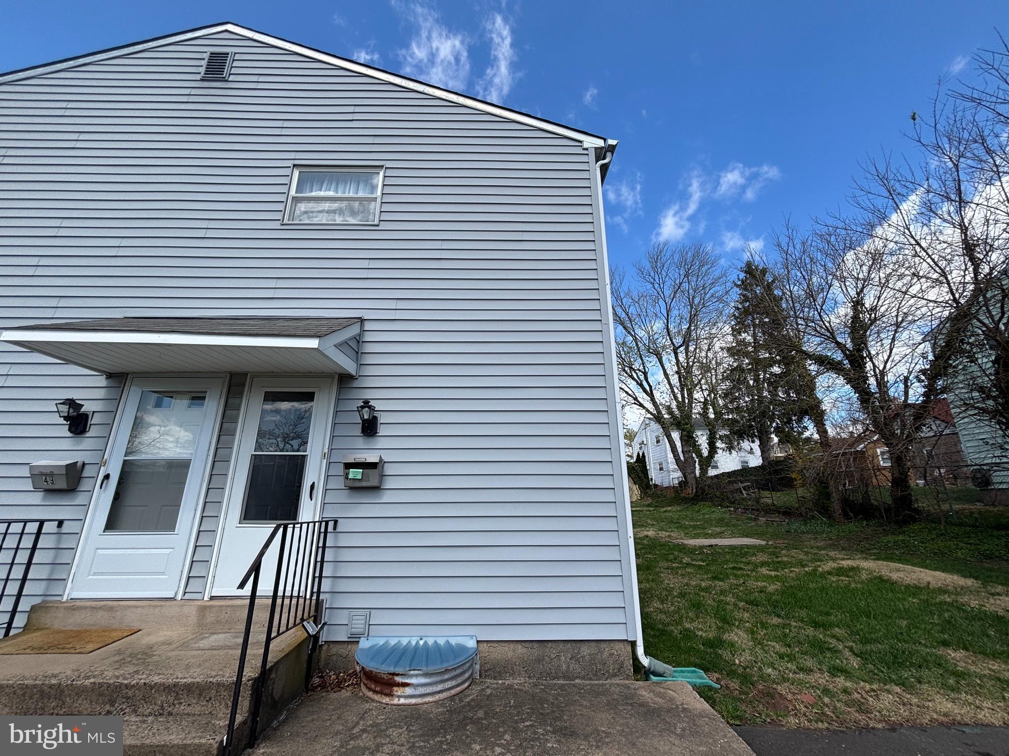 47 Walnut Street Ambler, PA 19002 - Photo 8 of 9 a view of a house with backyard and trees