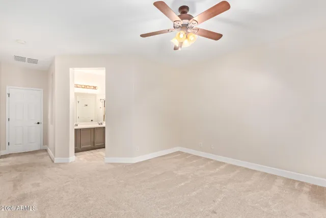 an empty room with a bathroom