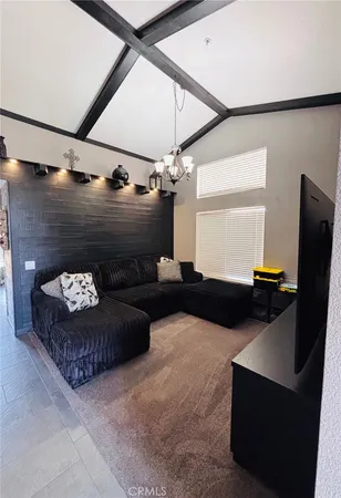 a bedroom with bed and window