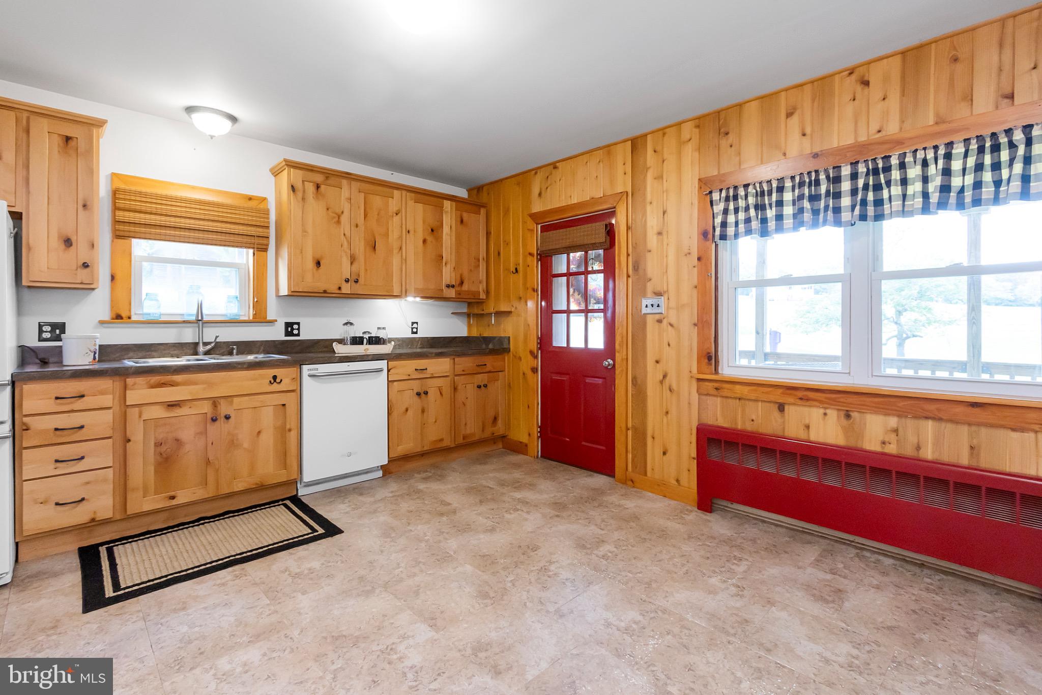 2485 Potomac Road Berkeley Springs, WV 25411 - Photo 11 of 60 Charming kitchen with rustic wood accents.