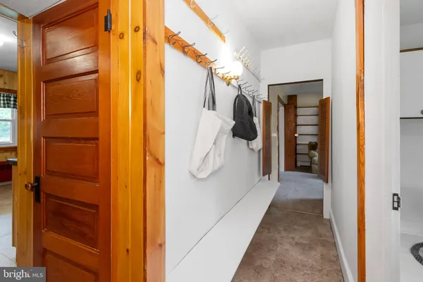 a bedroom with a bed and lamp