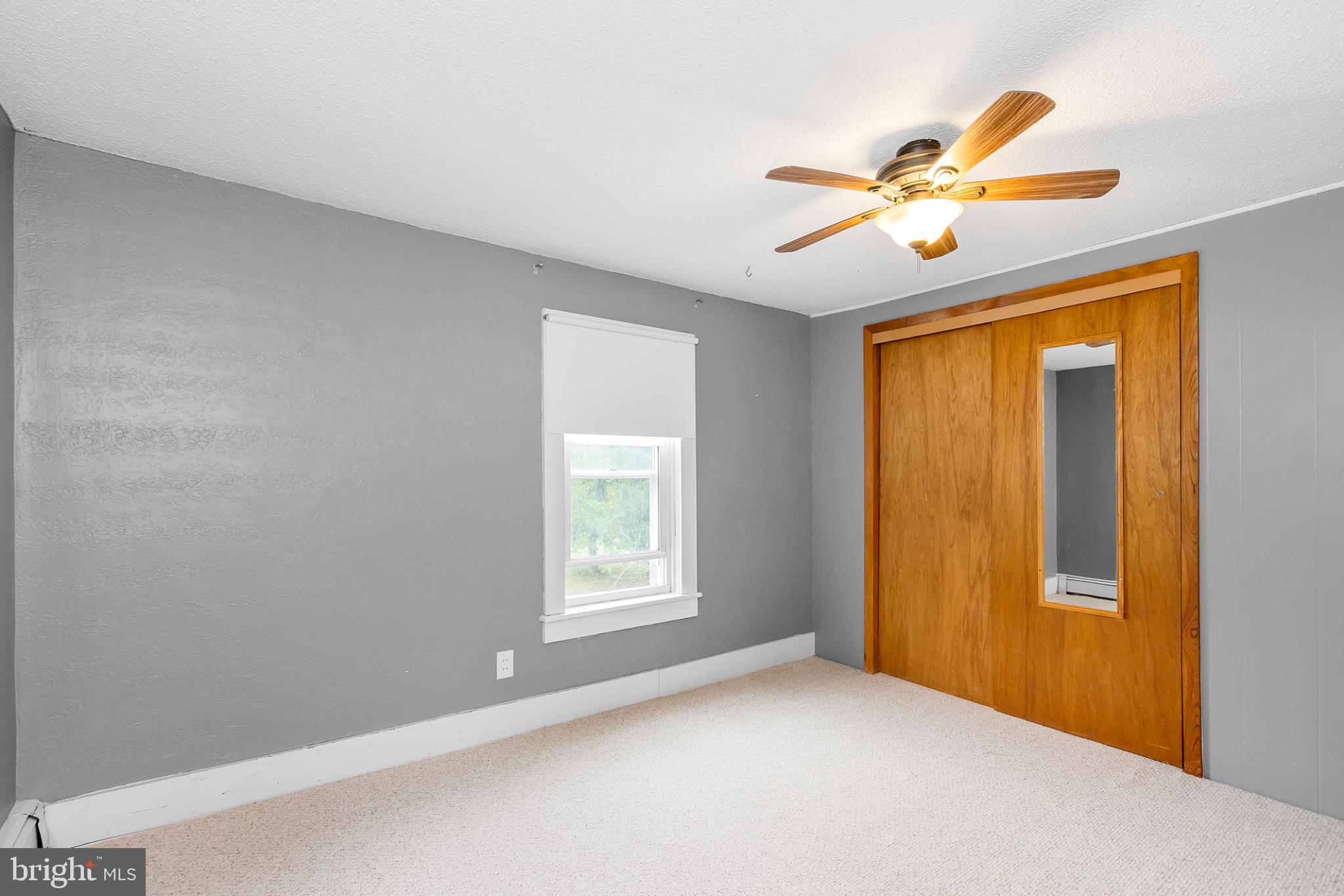 2485 Potomac Road Berkeley Springs, WV 25411 - Photo 41 of 60 a view of empty room with window