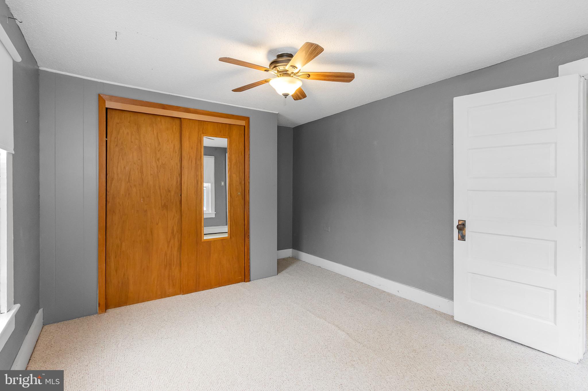 2485 Potomac Road Berkeley Springs, WV 25411 - Photo 43 of 60 a view of an empty room with a window