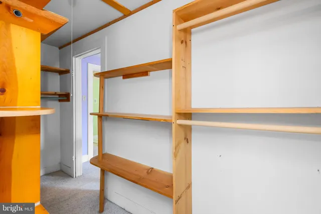 a view of a backyard with sitting area