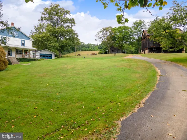 a view of roof with city view
