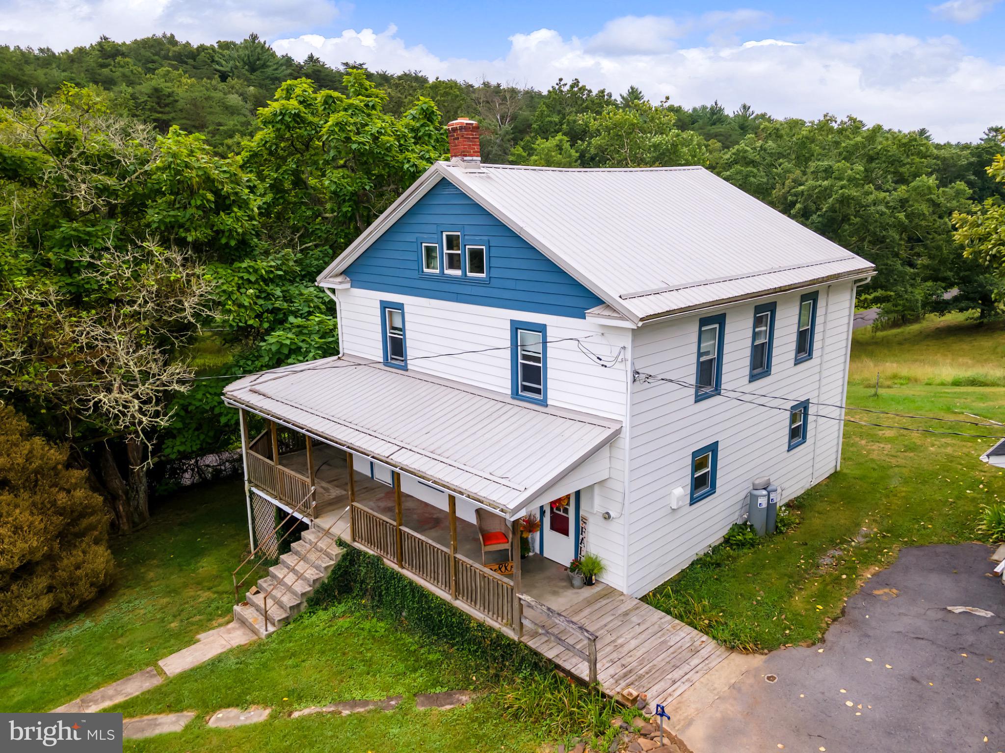2485 Potomac Road Berkeley Springs, WV 25411 - Photo 5 of 60 an aerial view of a house with a yard