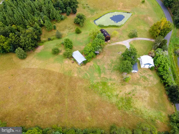 a view of a backyard with a small pool