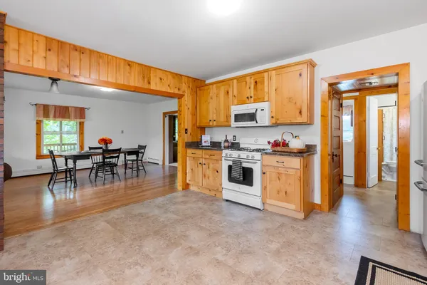 a view of livingroom with furniture and a window