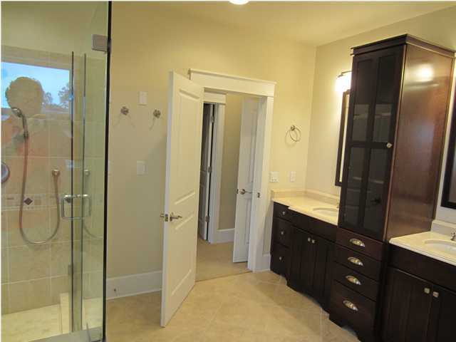 6272 Co Road Santa Rosa Beach, FL 32459 - Photo 13 of 19 a bathroom with a mirror sink and double