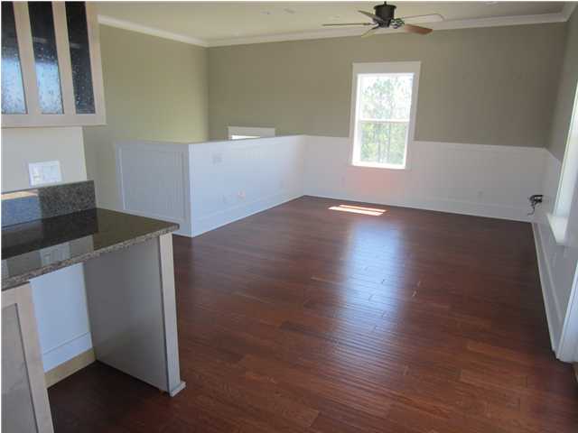 6272 Co Road Santa Rosa Beach, FL 32459 - Photo 15 of 19 an empty room with wooden floor and windows