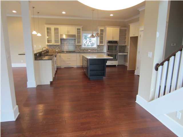 6272 Co Road Santa Rosa Beach, FL 32459 - Photo 4 of 19 a large kitchen with granite countertop a large counter top and stainless steel appliances