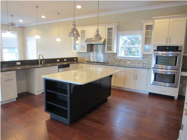6272 Co Road Santa Rosa Beach, FL 32459 - Photo 5 of 19 a view of kitchen with stainless steel appliances granite countertop a stove a sink and a microwave