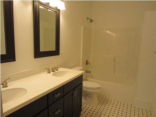 6272 Co Road Santa Rosa Beach, FL 32459 - Photo 8 of 19 a bathroom with a sink a toilet and shower