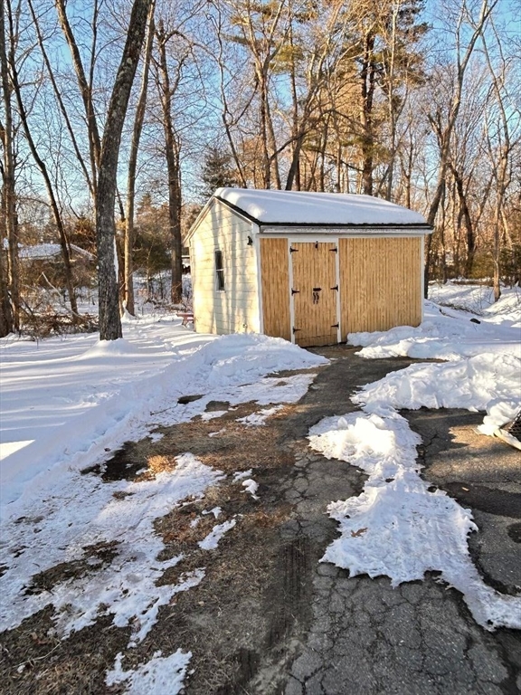 109 Blackstone Street, Unit 109 Bellingham, MA 02019 - Photo 4 of 15 a view of a yard with large tree