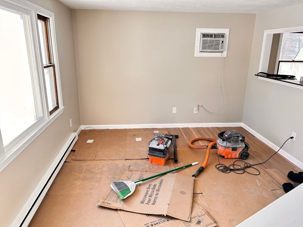 109 Blackstone Street, Unit 109 Bellingham, MA 02019 - Photo 6 of 15 a view of a room with gym equipment