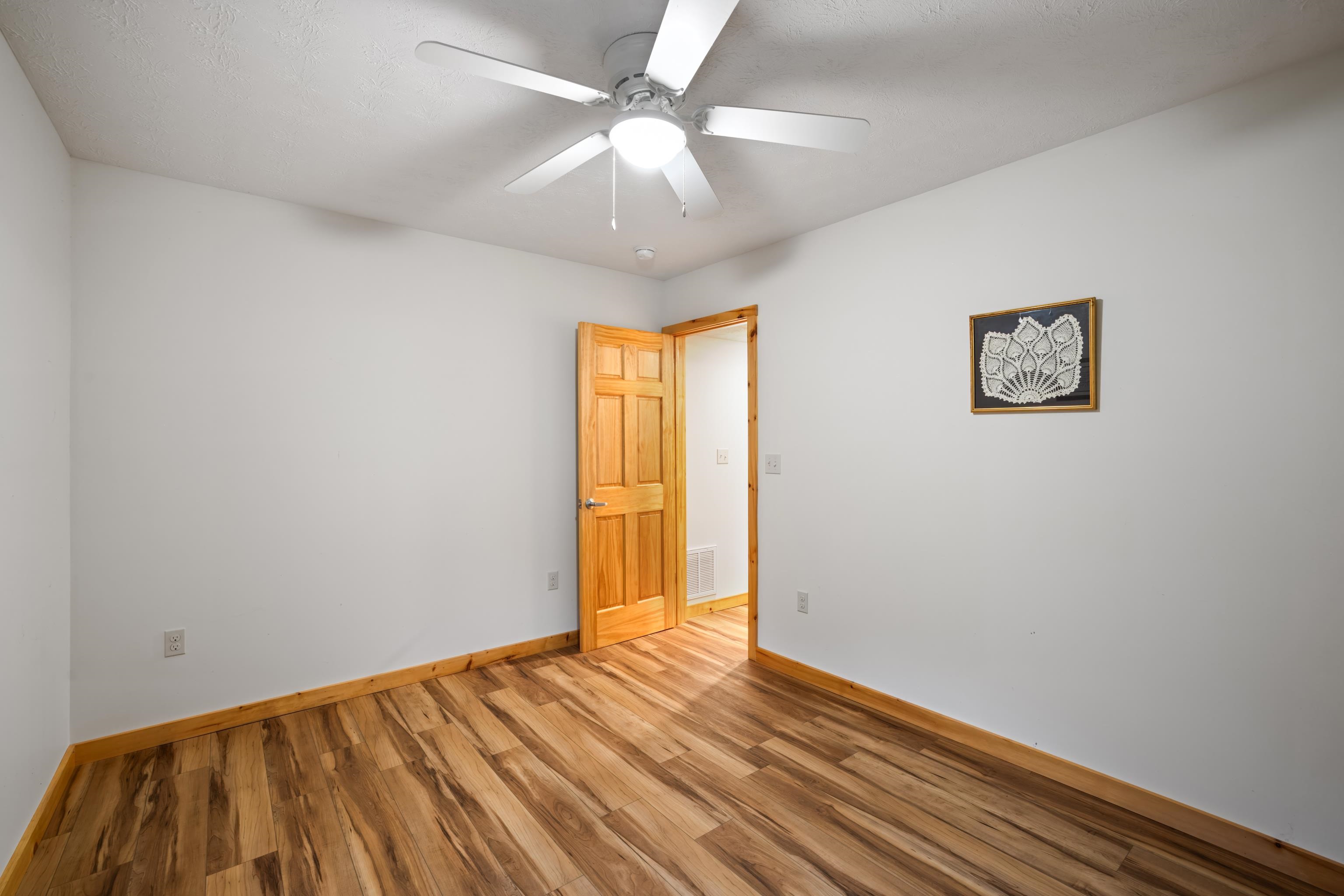232 Old Back Road Raphine, VA 24472 - Photo 25 of 62 a view of empty room with wooden floor