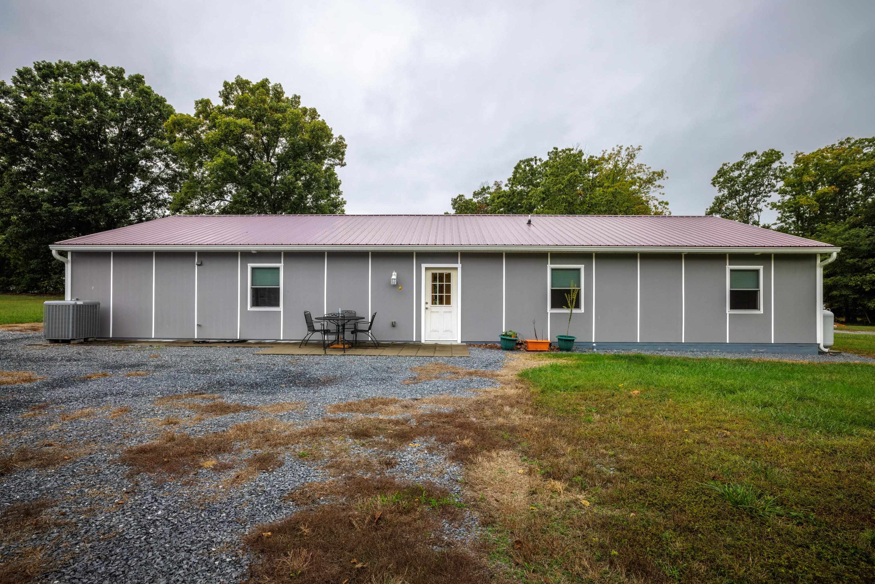 232 Old Back Road Raphine, VA 24472 - Photo 44 of 62 a front view of a house with a garden
