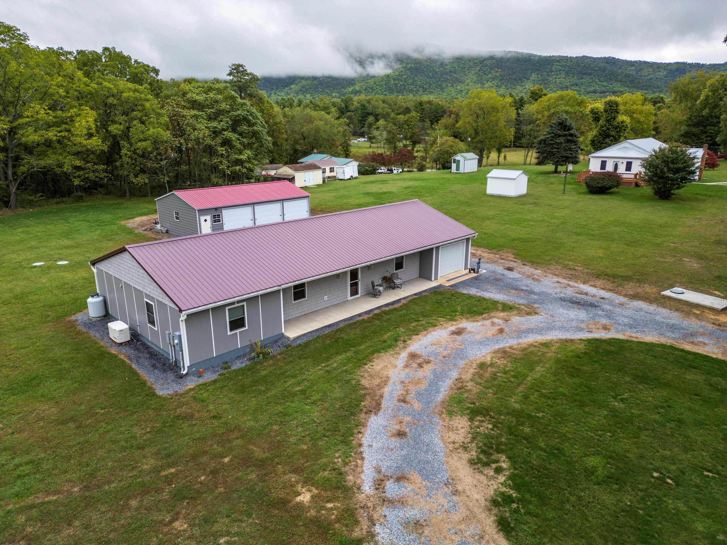 232 Old Back Road Raphine, VA 24472 - Photo 51 of 62 an aerial view of a house with garden space and street view