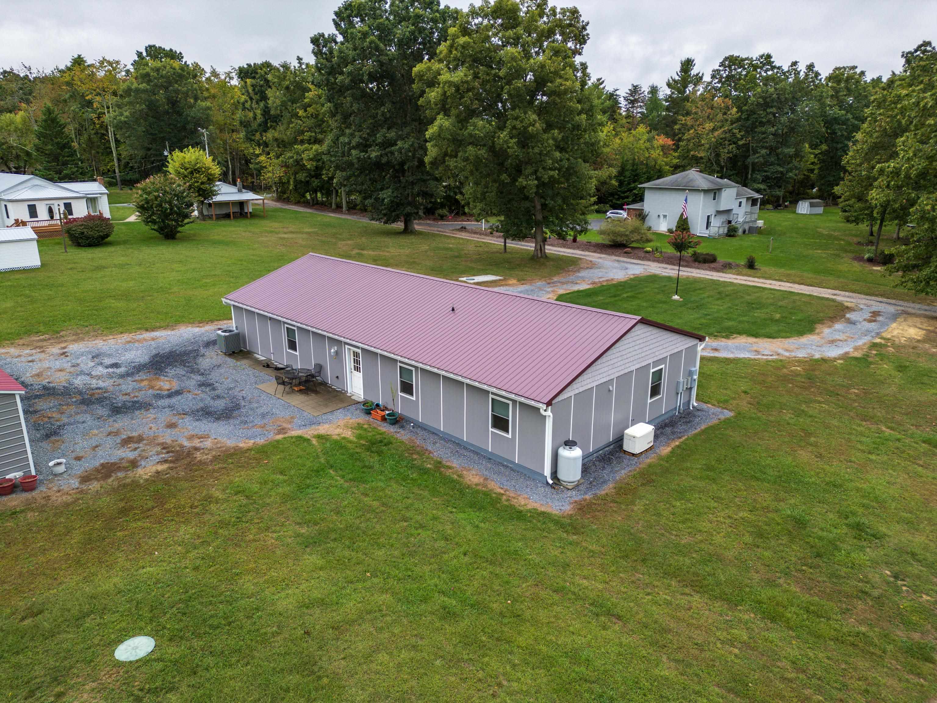 232 Old Back Road Raphine, VA 24472 - Photo 53 of 62 a aerial view of a house with a yard table and chairs