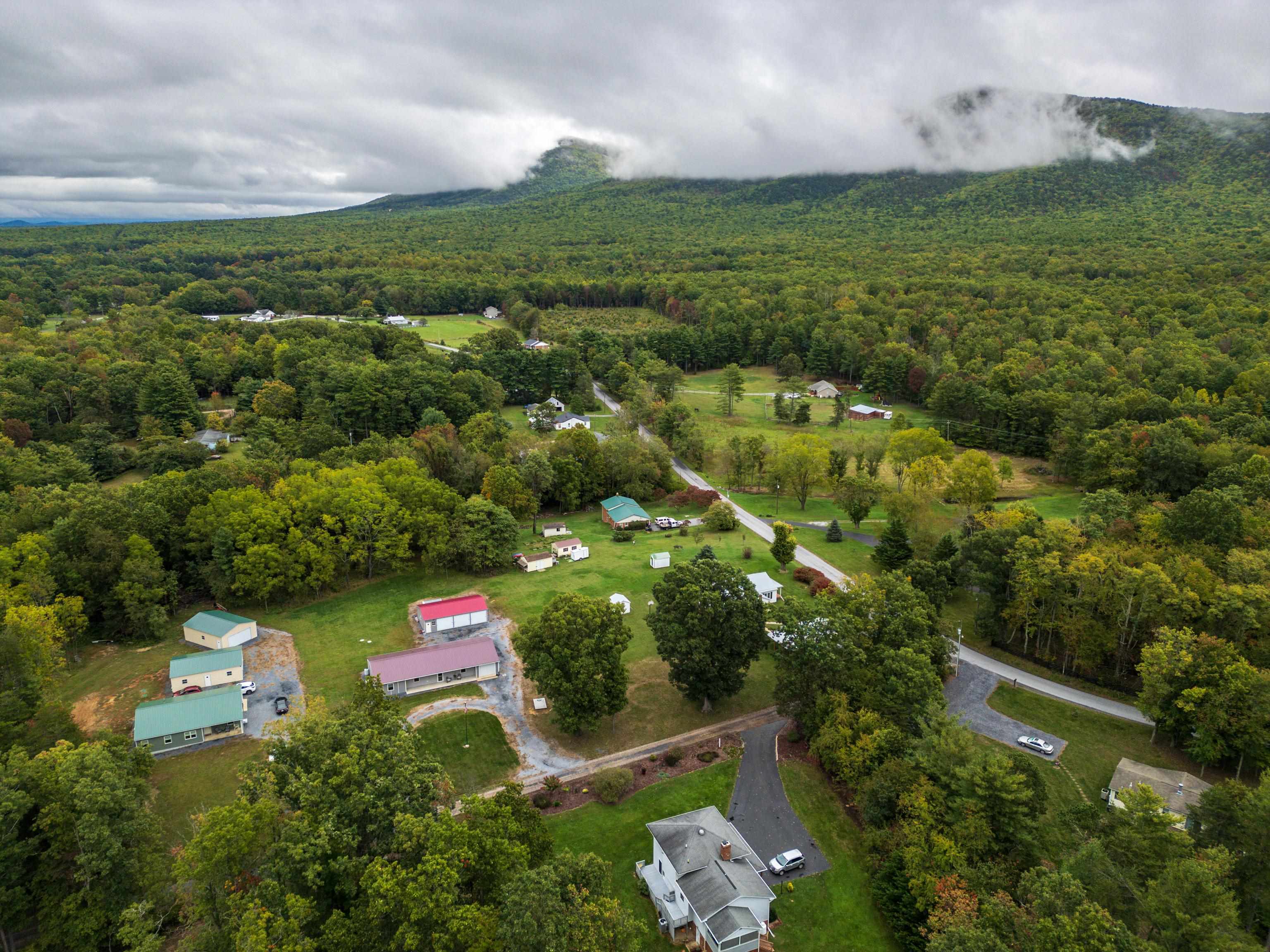 232 Old Back Road Raphine, VA 24472 - Photo 61 of 62 an aerial view of residential houses with outdoor space and trees