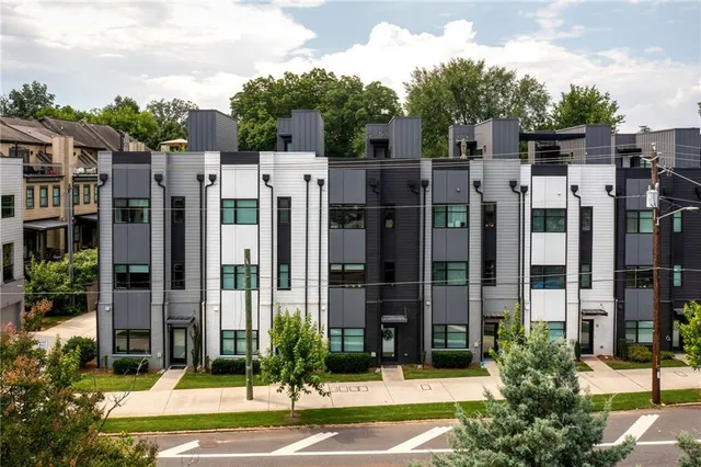 a front view of a building with garden