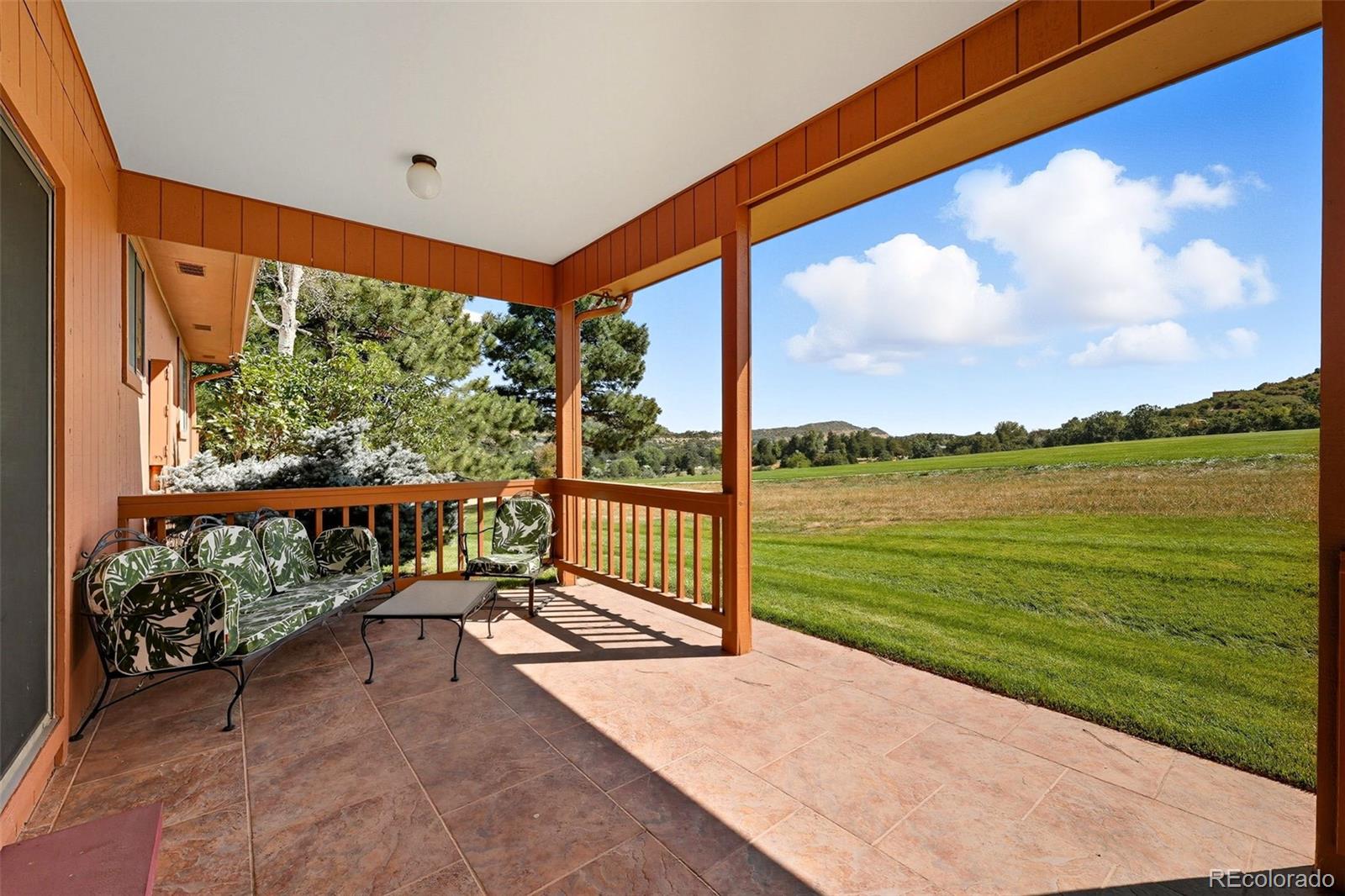 16066 Ridge Tee Drive Morrison, CO 80465 - Photo 13 of 41 a city view from a balcony