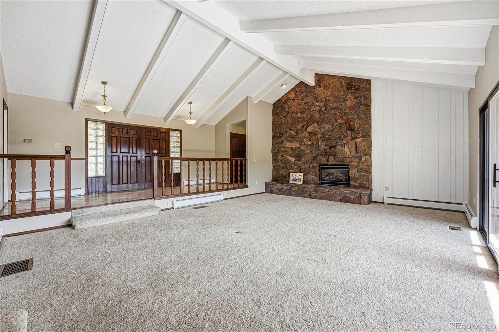 16066 Ridge Tee Drive Morrison, CO 80465 - Photo 17 of 41 a view of an empty room with entrance