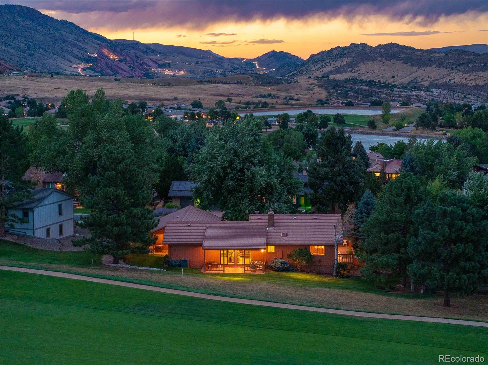 16066 Ridge Tee Drive Morrison, CO 80465 - Photo 39 of 41 an aerial view of a house with mountain view