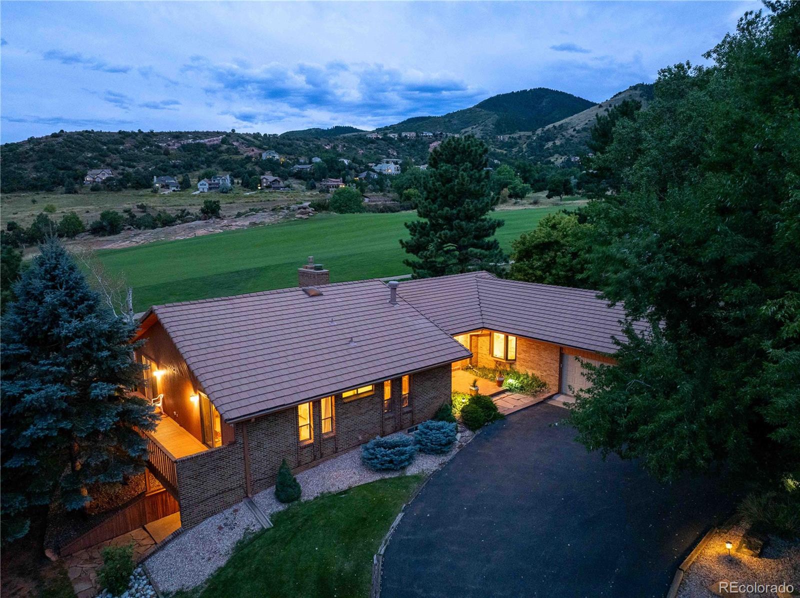 16066 Ridge Tee Drive Morrison, CO 80465 - Photo 40 of 41 an aerial view of a house with big yard