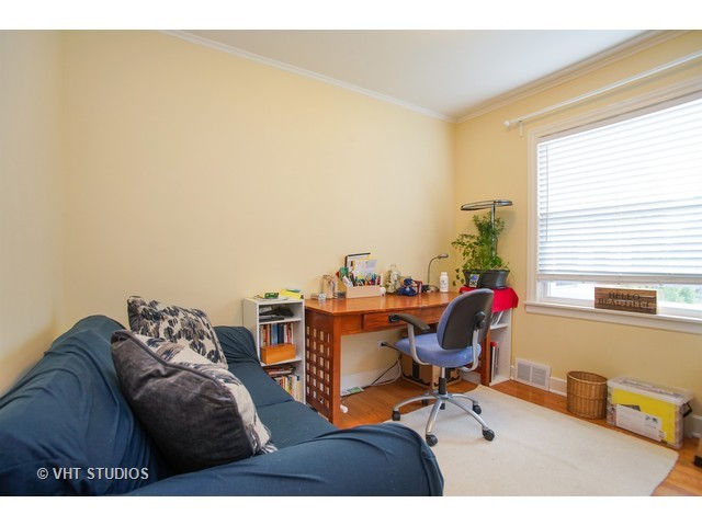 1813 Marguerite Street Park Ridge, IL 60068 - Photo 11 of 15 a living room with furniture and a window