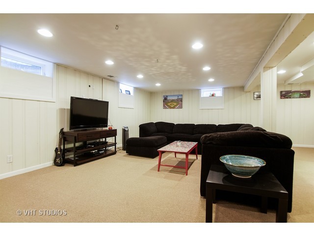 1813 Marguerite Street Park Ridge, IL 60068 - Photo 13 of 15 a living room with furniture and a flat screen tv