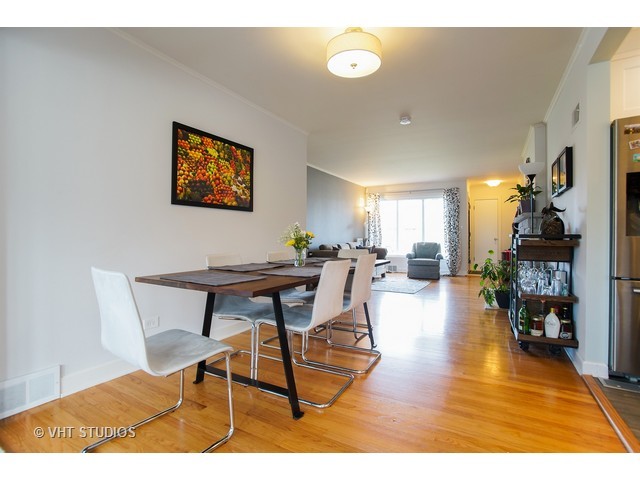 1813 Marguerite Street Park Ridge, IL 60068 - Photo 3 of 15 a view of a dining room with furniture and wooden floor