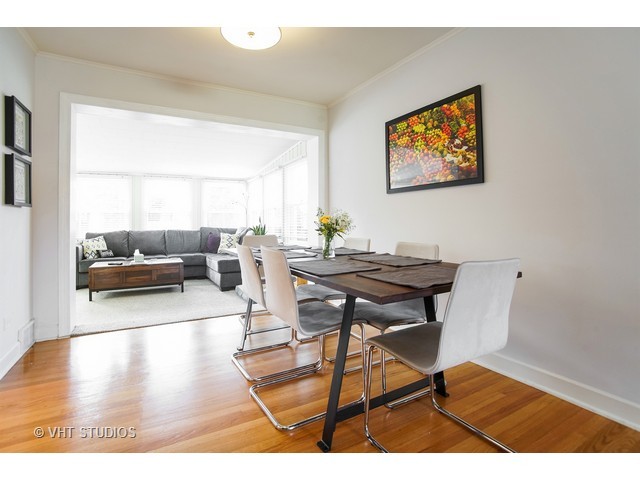 1813 Marguerite Street Park Ridge, IL 60068 - Photo 4 of 15 a view of a livingroom and dining room with wooden floor