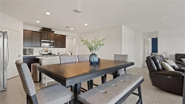 a view of a dining room with furniture