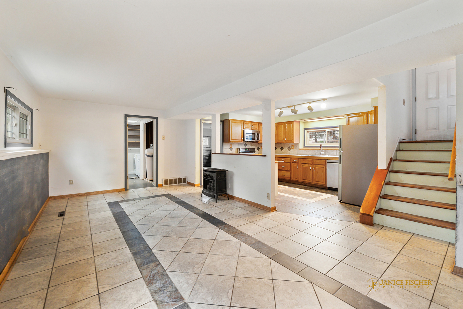 418 Glen Garry Road Cary, IL 60013 - Photo 4 of 15 a view of a livingroom with wooden floor and furniture