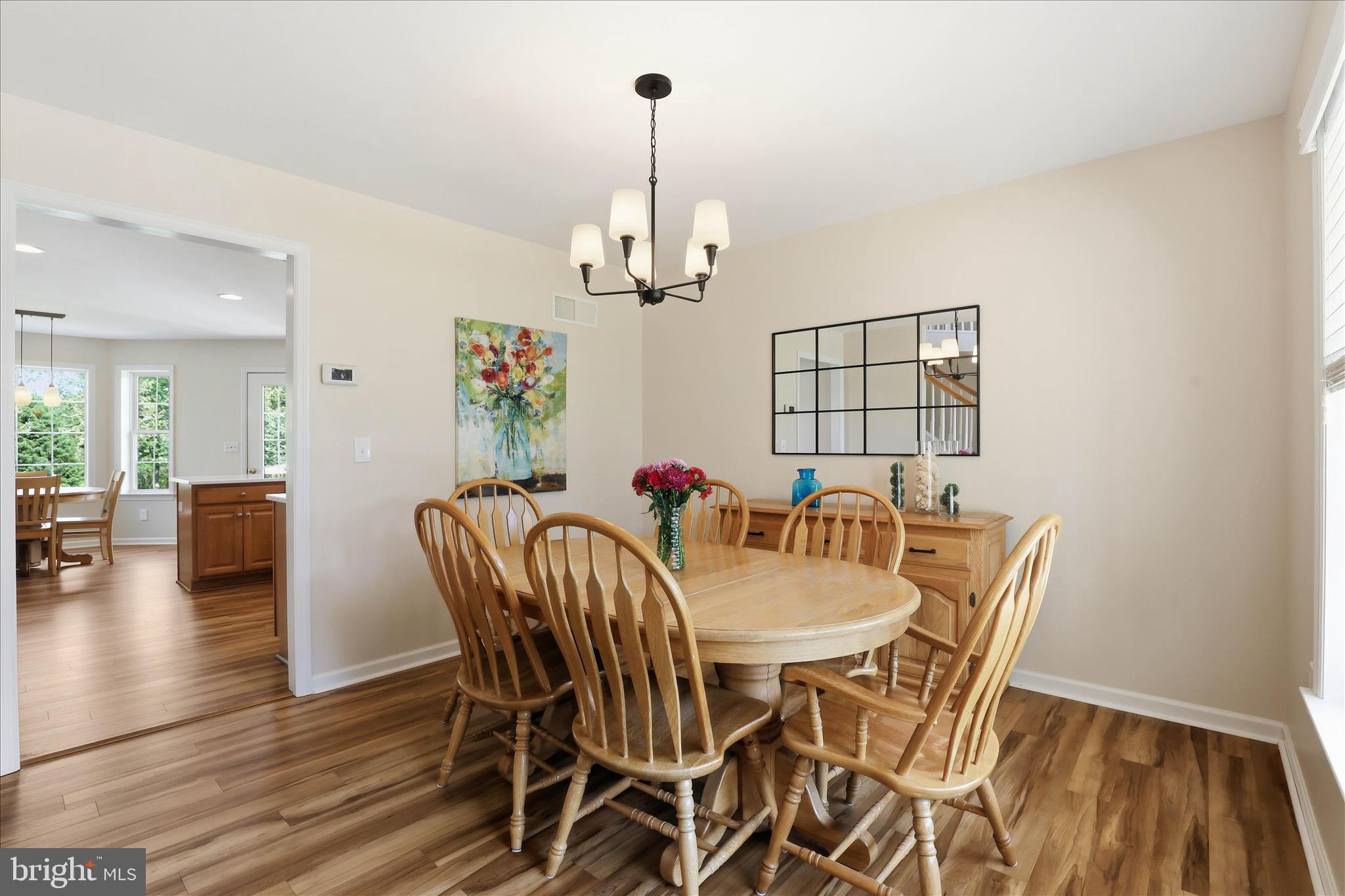 533 Thornberry Lane Lititz, PA 17543 - Photo 5 of 56 a view of a dining room with furniture and wooden floor