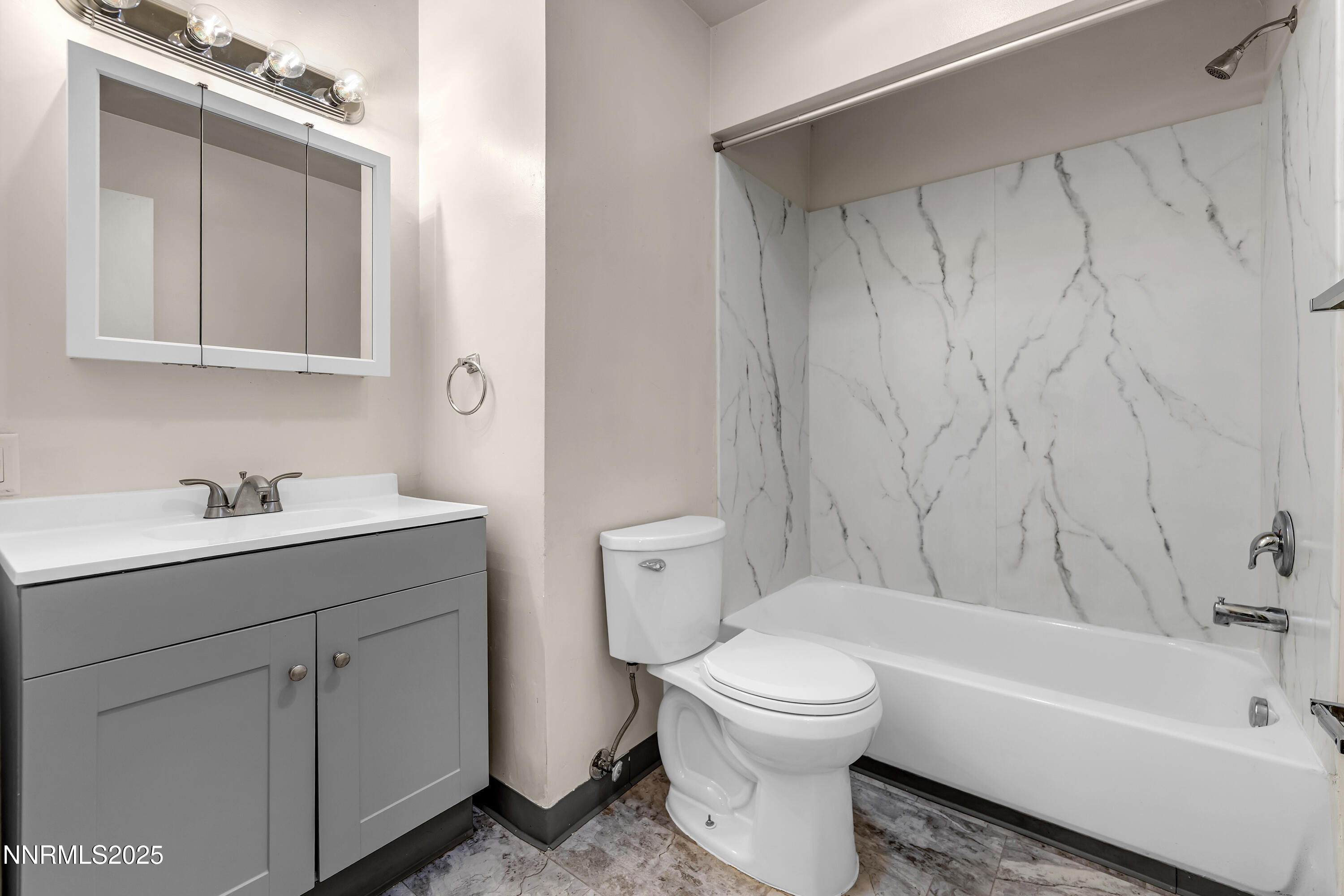 234 18th Street Sparks, NV 89431 - Photo 19 of 51 a bathroom with a sink toilet and bathtub