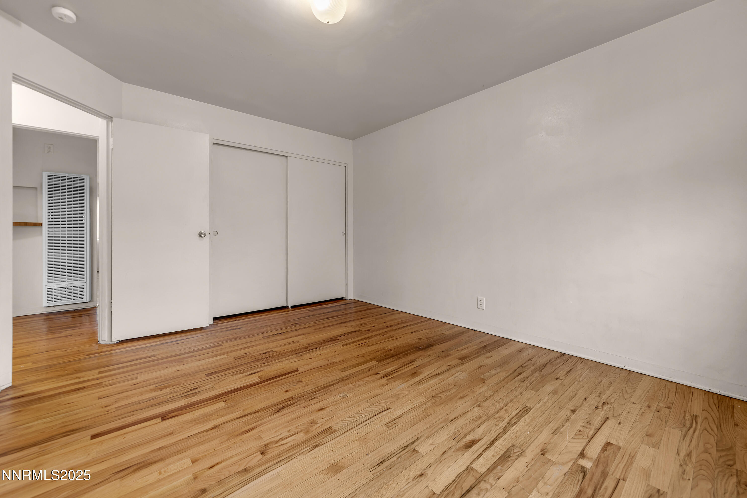234 18th Street Sparks, NV 89431 - Photo 20 of 51 a view of empty room with wooden floor