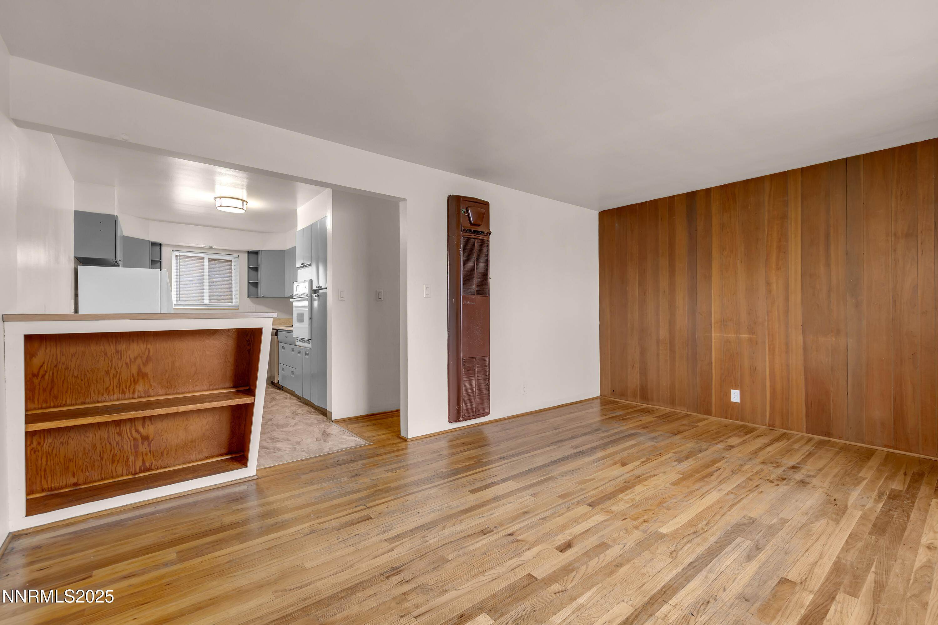 234 18th Street Sparks, NV 89431 - Photo 23 of 51 a view of a big room with wooden floor and cabinet