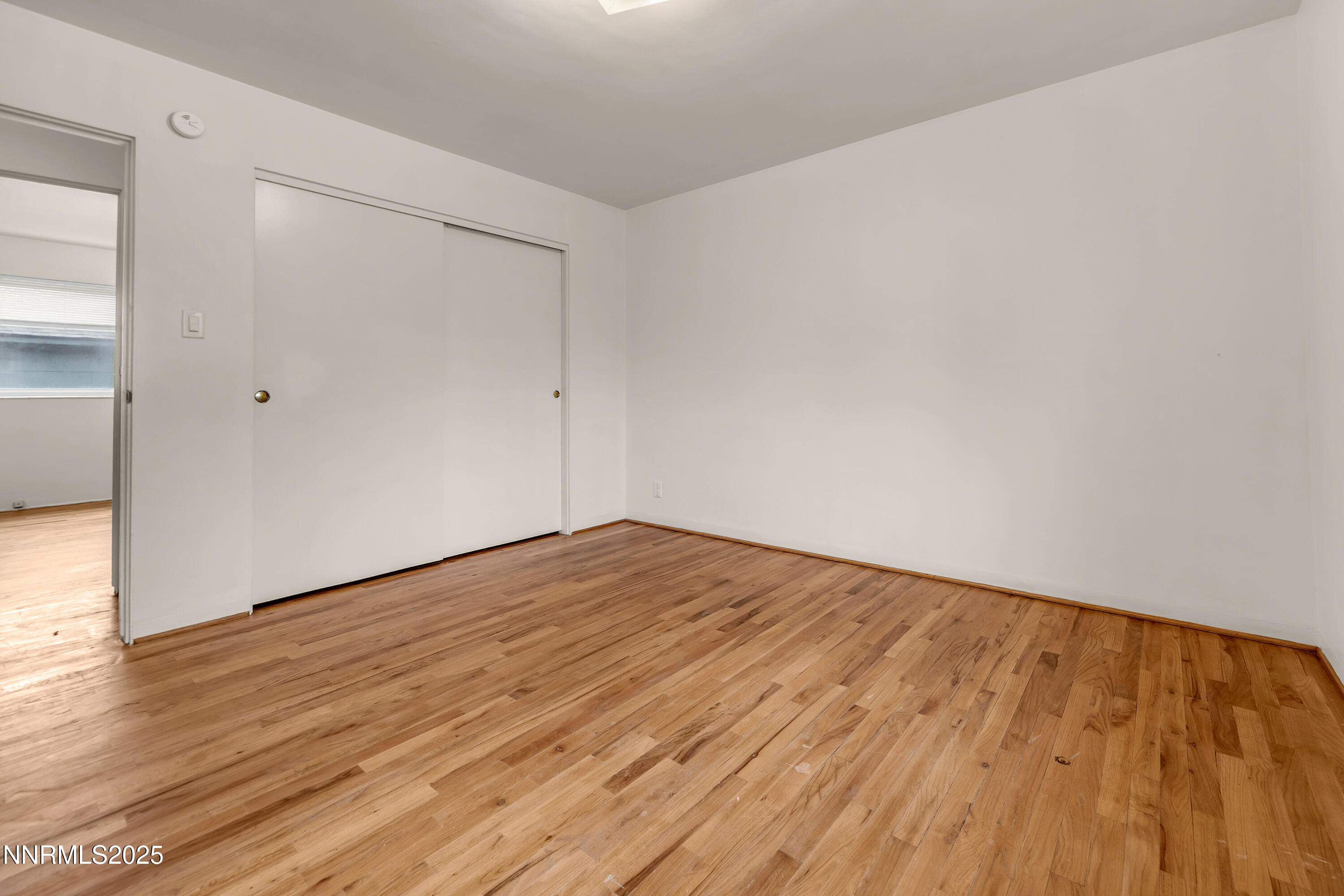234 18th Street Sparks, NV 89431 - Photo 34 of 51 a view of empty room with wooden floor